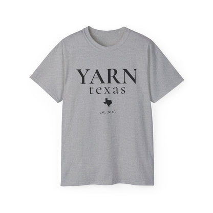 A heather gray short-sleeve crewneck t-shirt with 'YARN texas est. 2026' printed in black on the front, displayed against a solid white background.