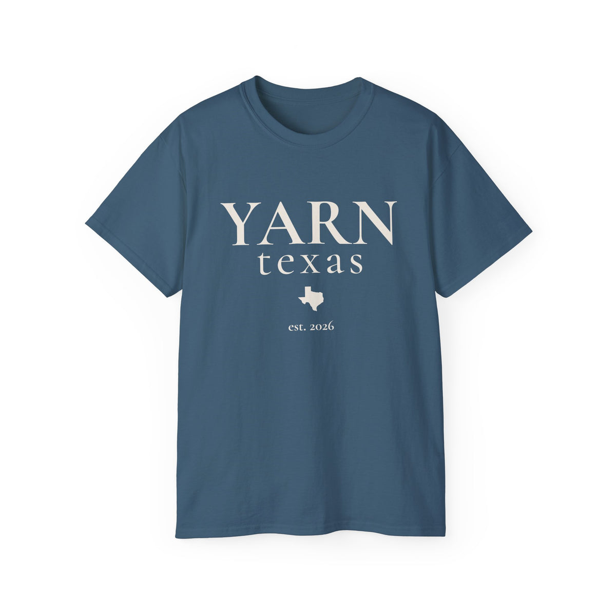 A blue short-sleeve crewneck t-shirt with 'YARN texas est. 2026' printed in black on the front, displayed against a solid white background.