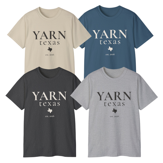 Four short-sleeve crewneck T-shirts arranged in a 2x2 grid on a white background, each with the text 'YARN texas' and a small Texas-shaped logo printed on the chest. The shirts are in beige, blue, charcoal gray, and light gray.